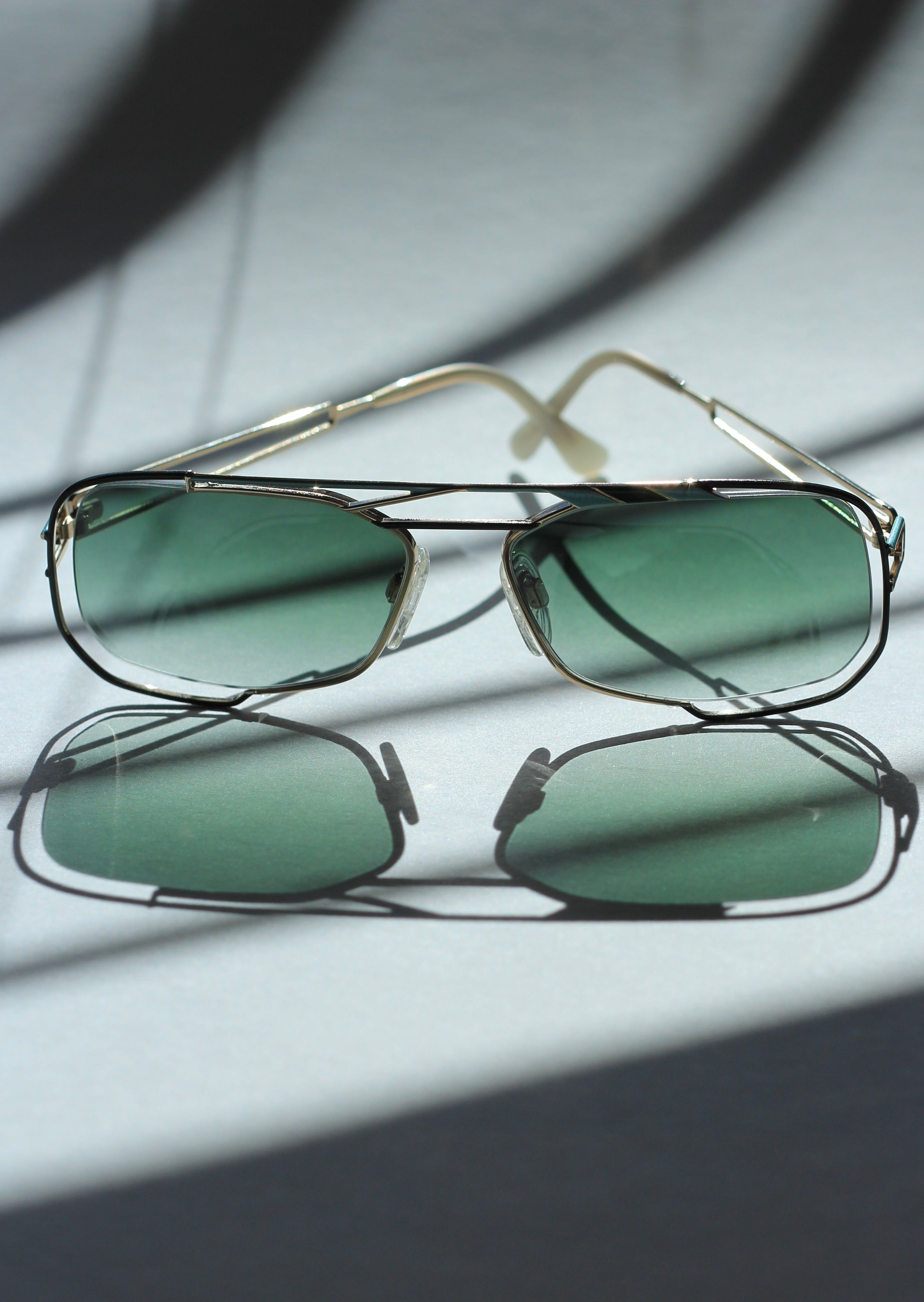 Revo 1106 001 Small Oval Green Mirror Sunglasses